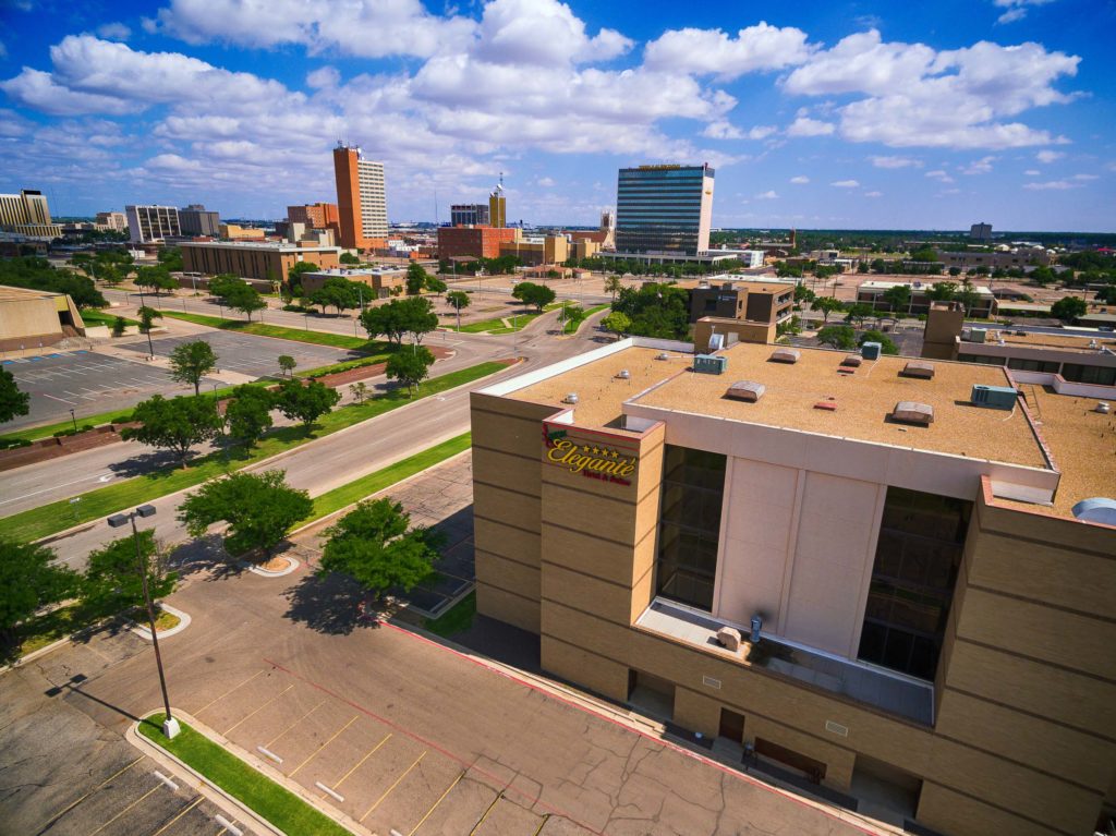 Aerial Photo of MCM Elegante Lubbock with Downtown Lubbock in the background.